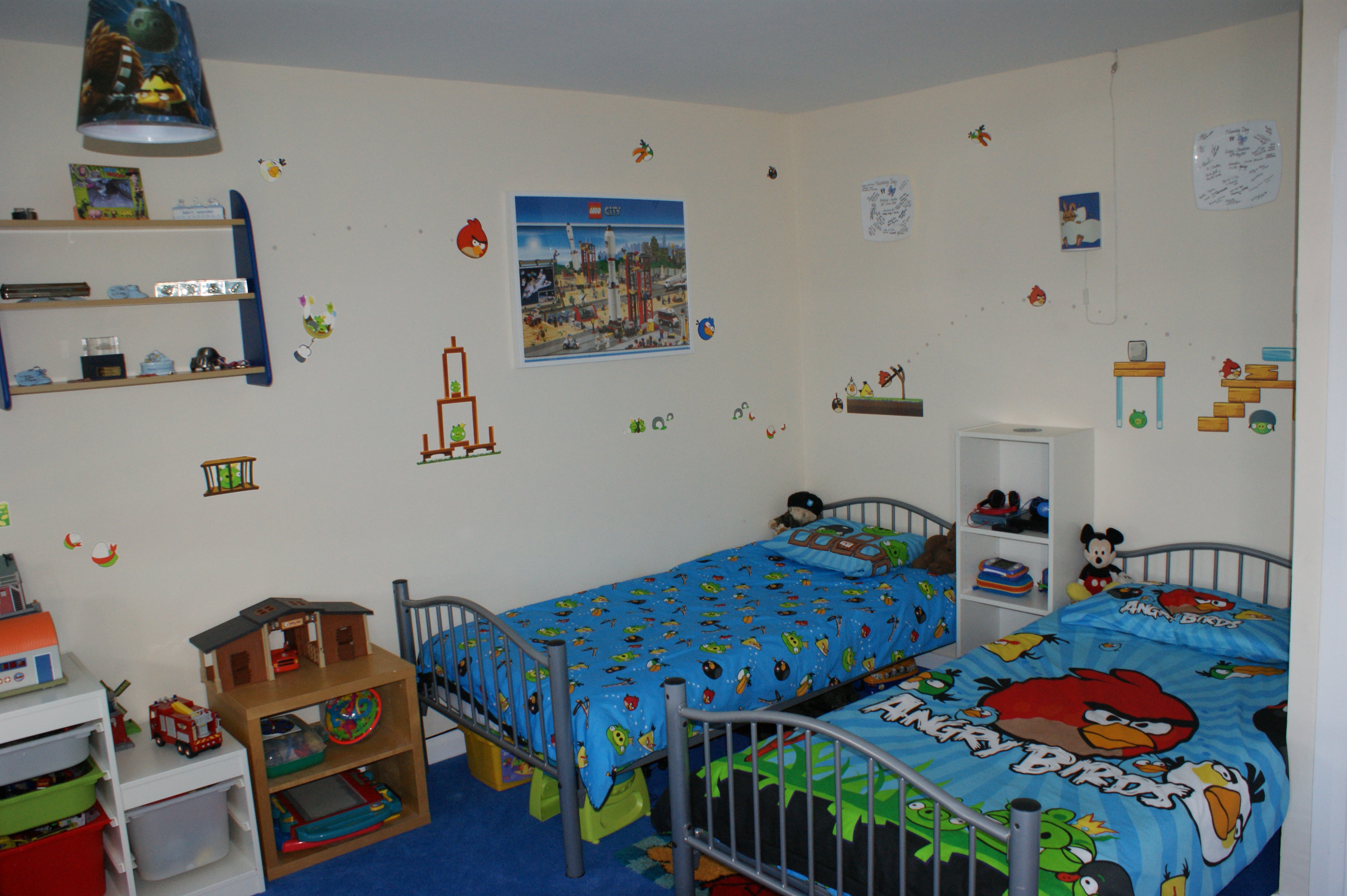 A childs bedroom with newly built beds and furniture.