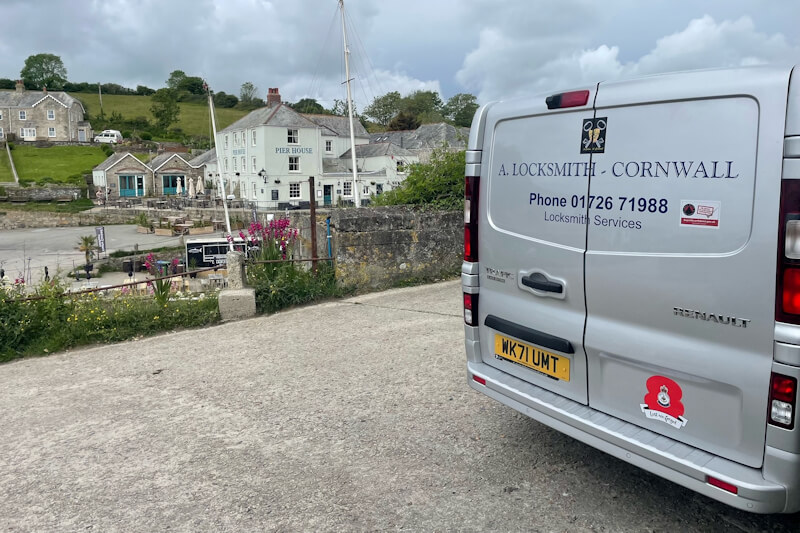 A Locksmiths Cornwall Van in front of the sea