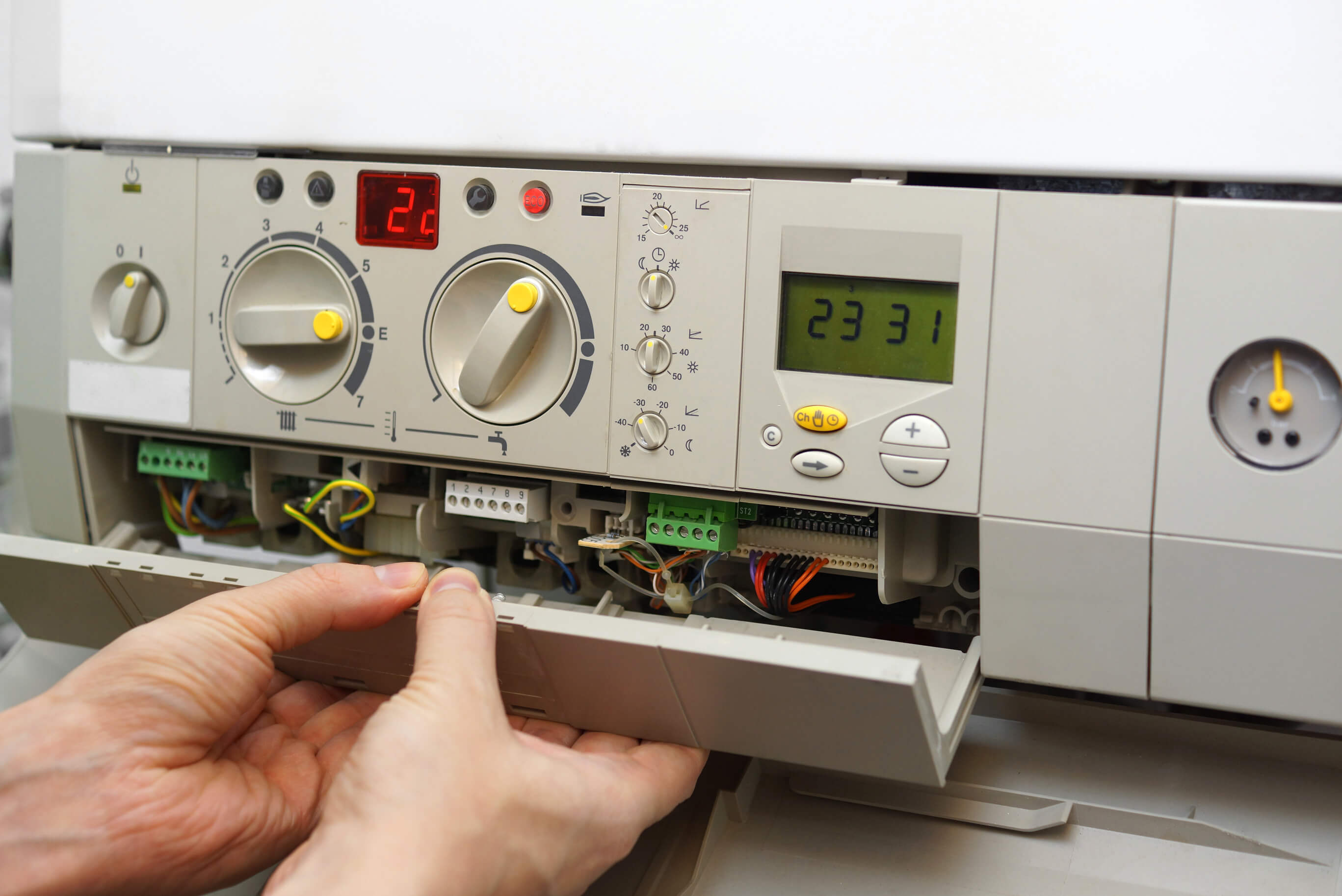 Man fixing a gas boiler