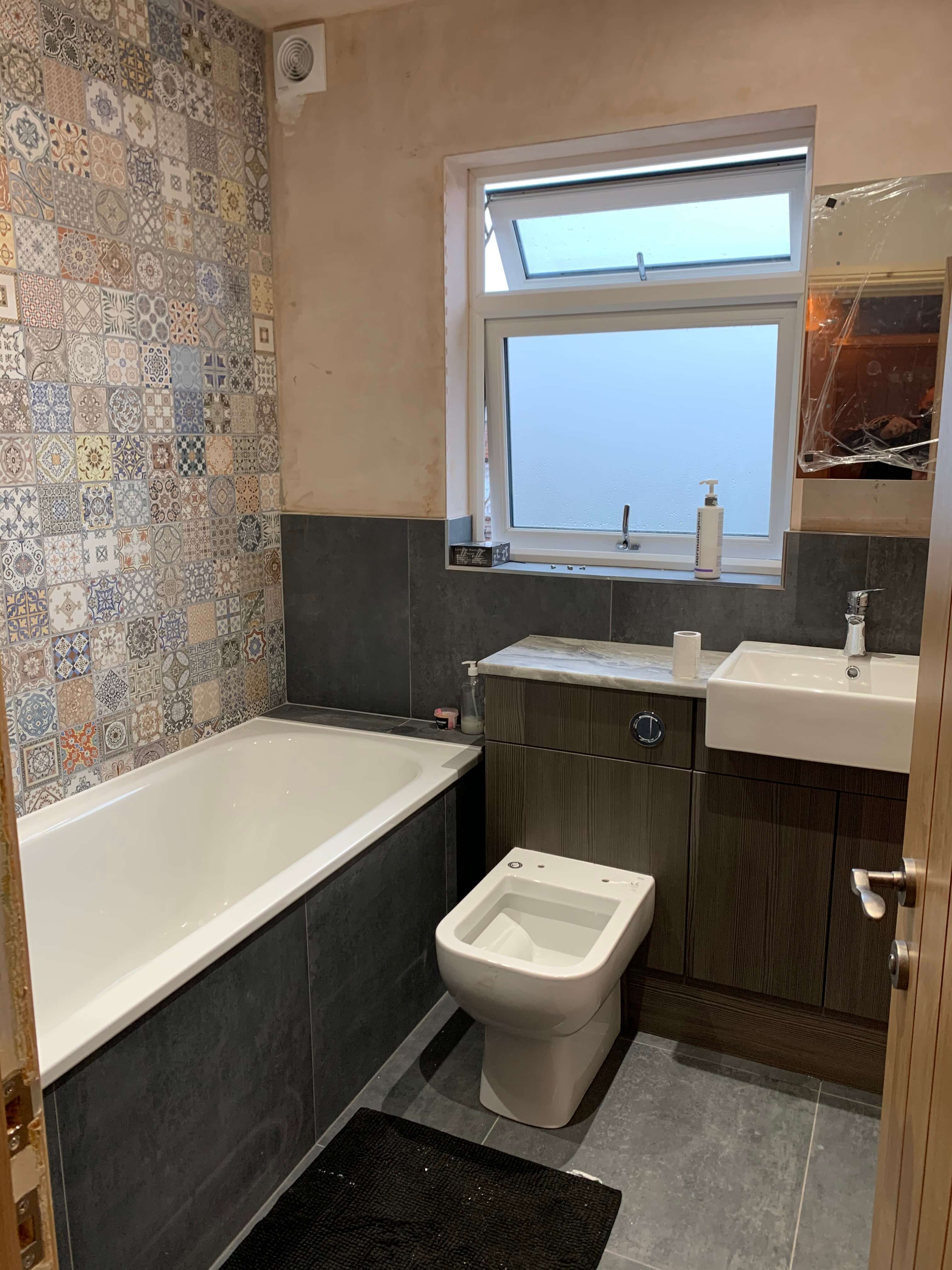 new modern bathroom installation, with contemporary bath and toilet
