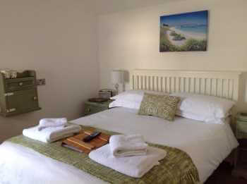 Evergreen provides clean living spaces within their cottages that include comfortable bedding.