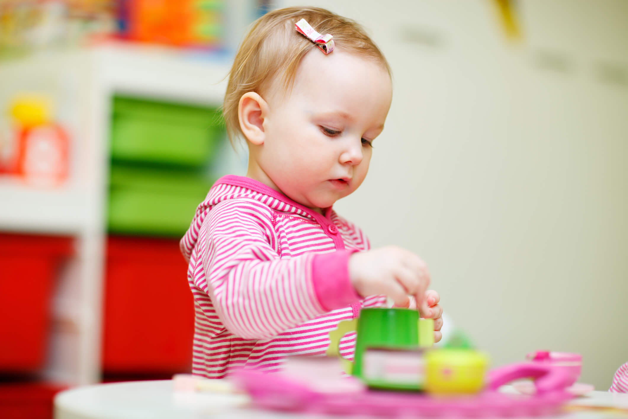 Toddler playing at table