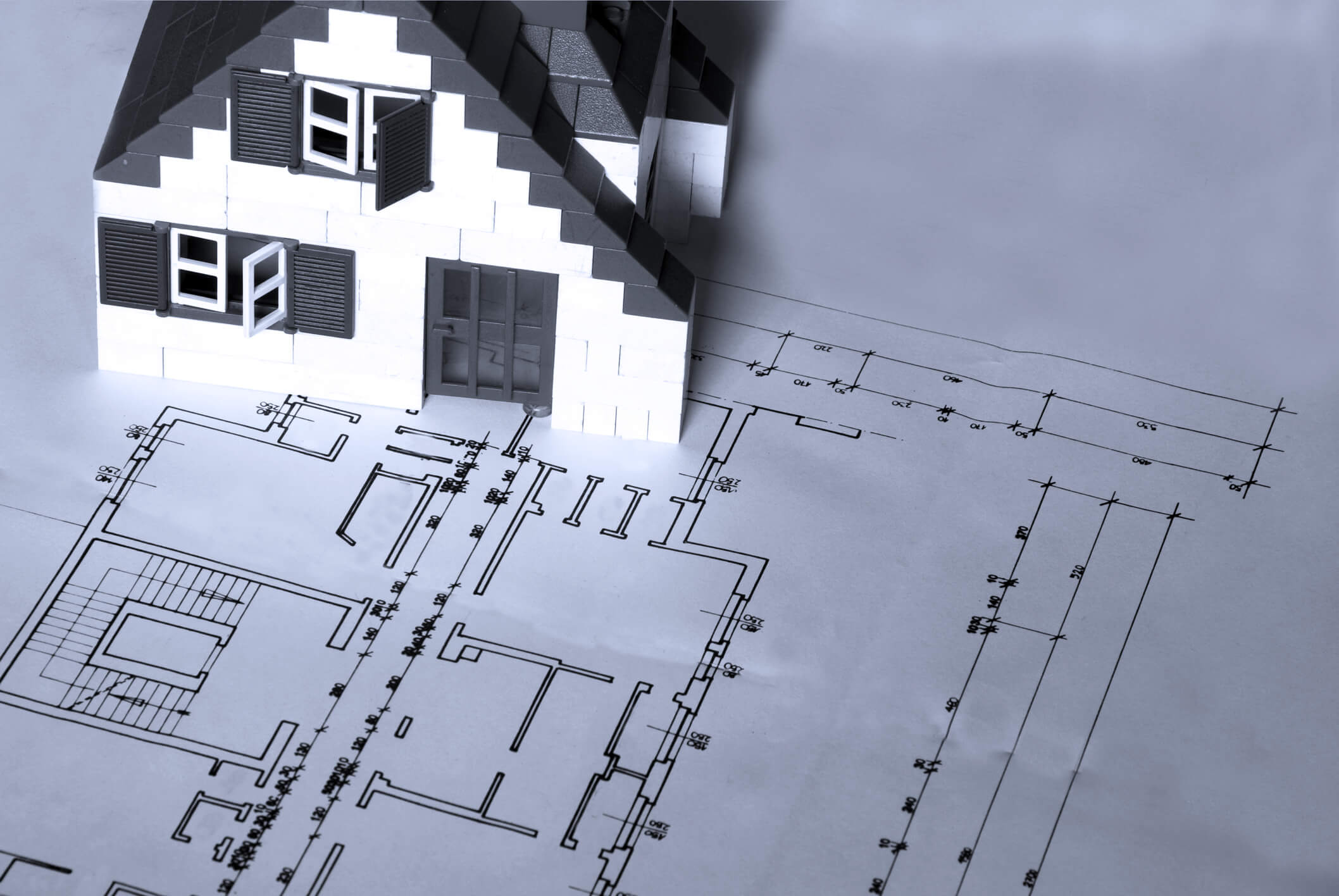 A close up of an house on an architectural building plan.