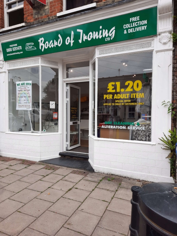 board of ironing shop front