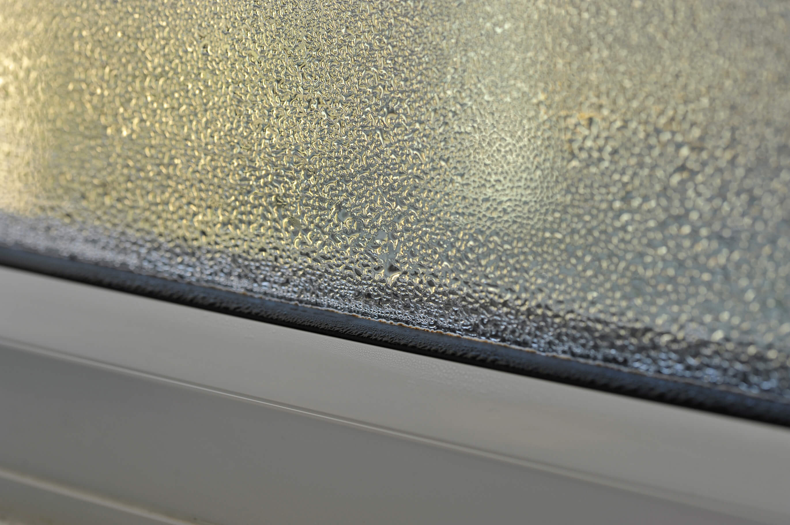 Condensation and damp problem on the inside of a double glazed window.