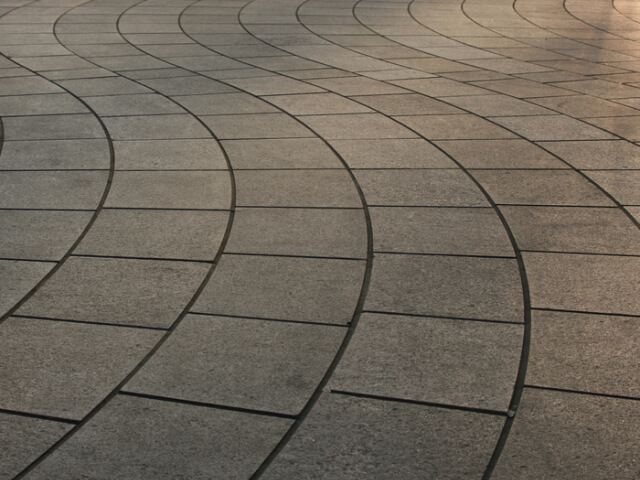 Fancy curved outdoor paving with uniform spacing