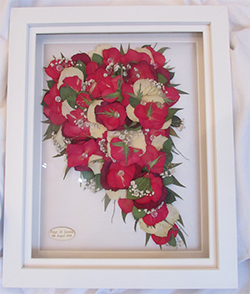 pressed flowers within picture frame