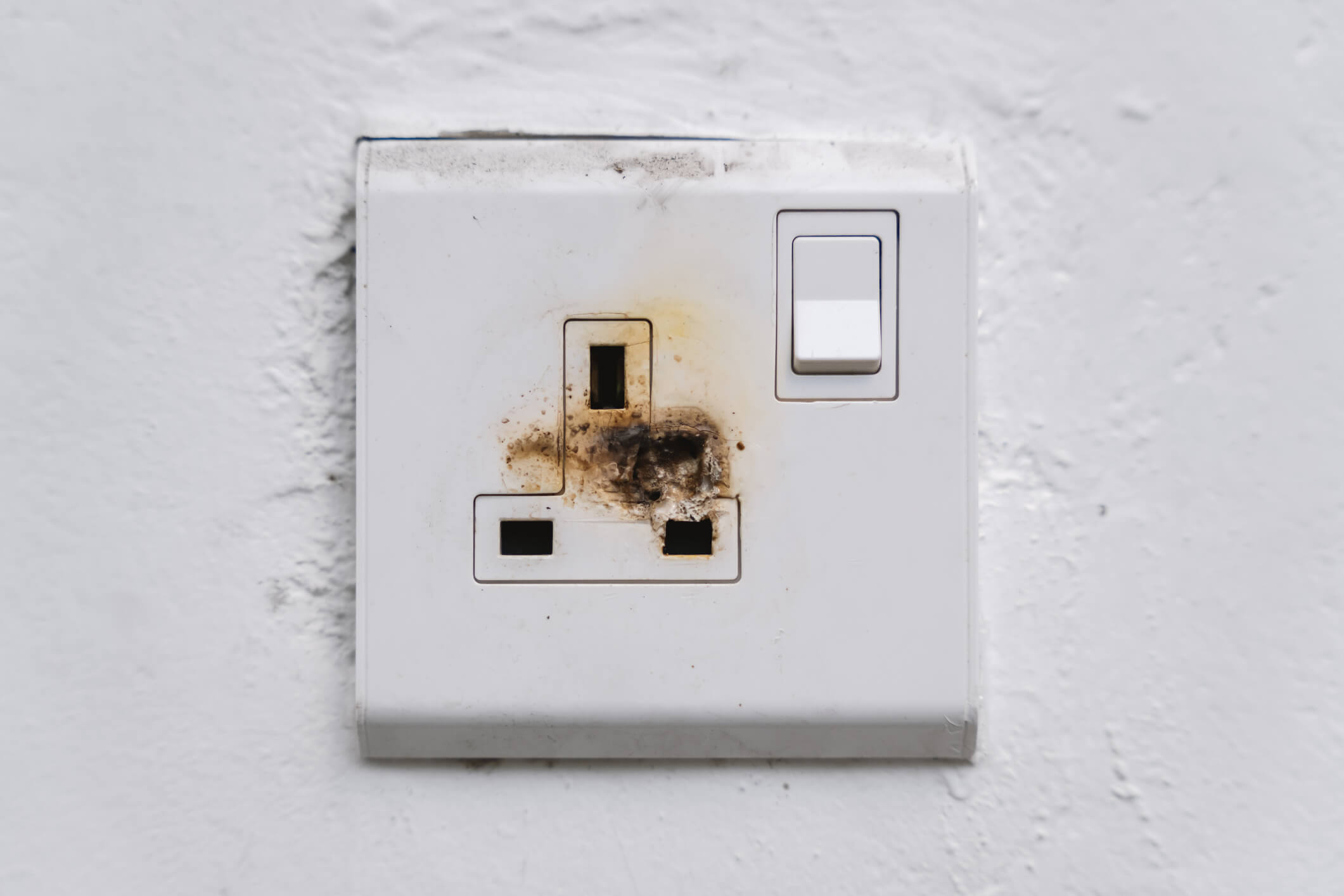 Burnt out 3 pin wall socket