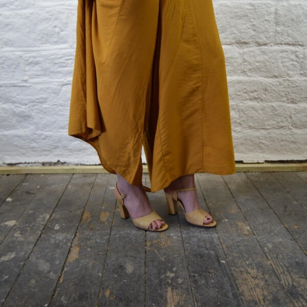 Vintage pants in a mustard yellow with mustard heels.