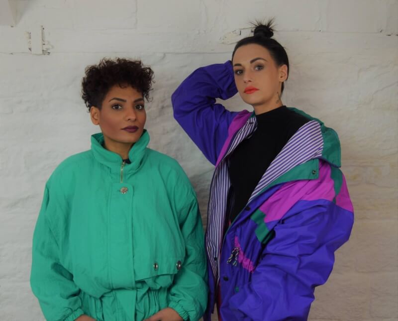 Two women in Vintage Colourful Jackets
