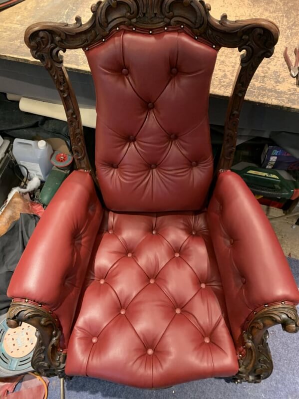 red leather chair re-upholstered
