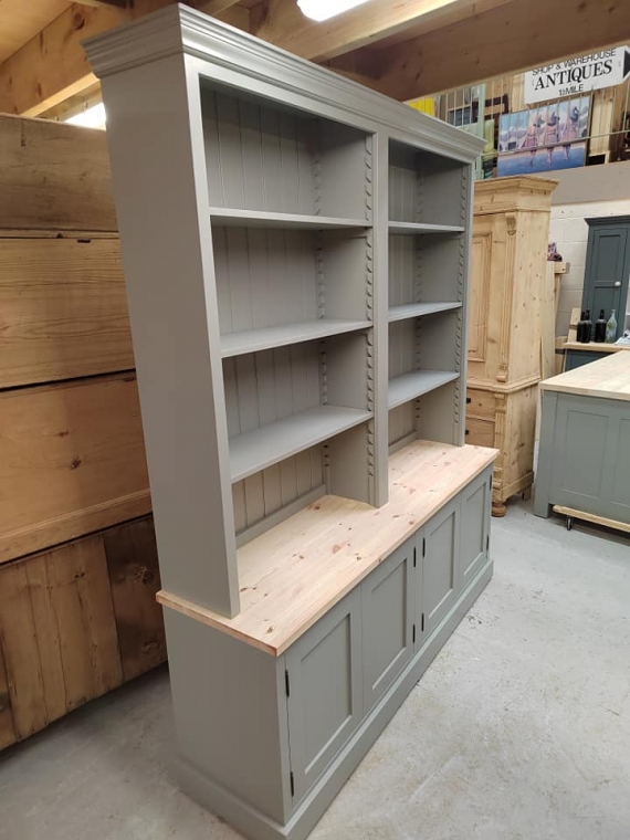 Handmade bookcase painted in Farrow and Ball Pigeon with a pine waxed