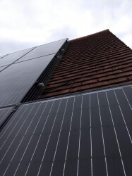 Picture of roof, featuring new bird proofing mesh for solar panels