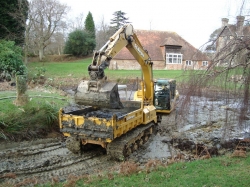 Wheeled dumpers really aren't an option in the bottom of a pond...