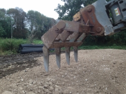 This is the ripping fork we used to rip the ground up (usually used for land clearance) but works well here