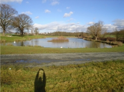 A 2 acre lake created with 2 islands to attract wildlife