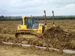 Our 18.5 ton Komatsu bulldozer is equipped with fully automated laser control system to create a perfect playing field.