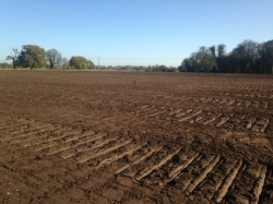 In the process of spreading topsoil over the pitches