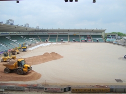 Next a layer of sand was spread over the pitch...