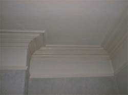  Together with redecoration the ornate coving had to be matched at each side of the opening  