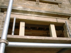  A reinforced concrete stone faced lintel was made and lifted into place to support the outer leaf and a steel beam inserted to support the inner leaf, using 2 lintels meant it was possible to lift them into place by hand  
