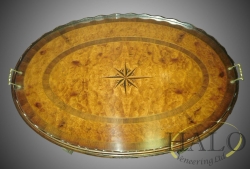  Veneered walnut oval tray top table.  Bur walnut with a hand cut star inlay and inset bandings. 