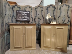 A near matching pair of painted old pine cupboards