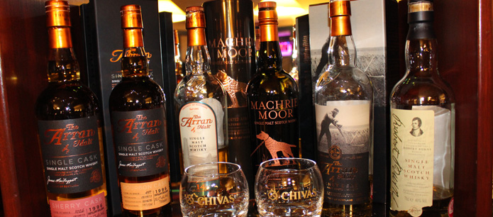 A selection of bottled whiskys behind the kildonan bar