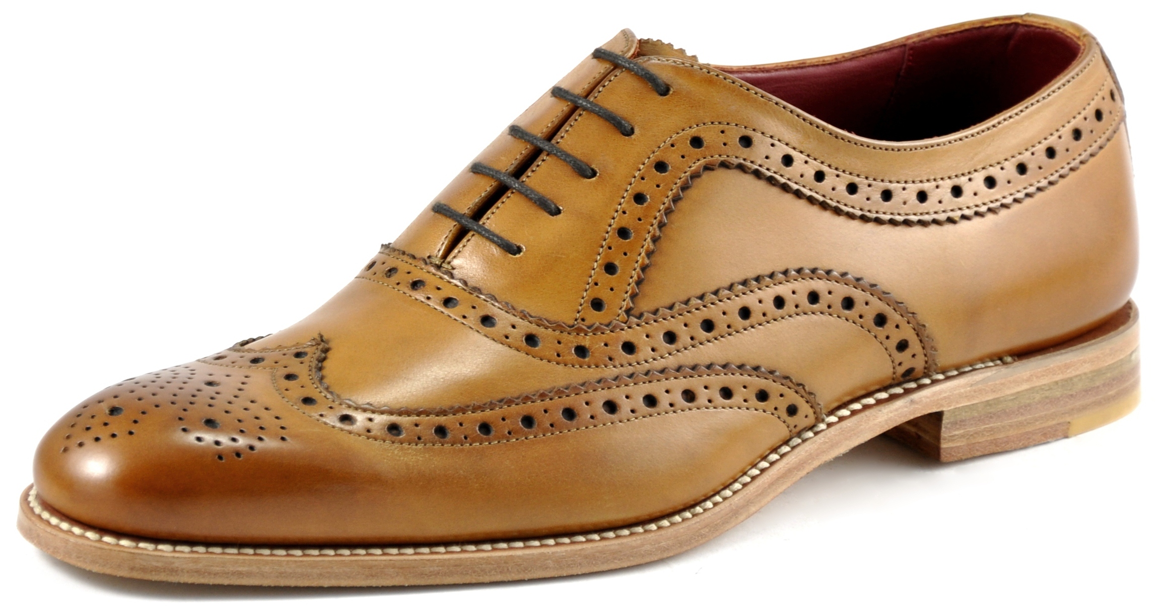 Stylish Brogue shoe featuring fine punched brogue detail and a Goodyear Welted sole, with a natural edge finish. Made by Loake Shoemakers