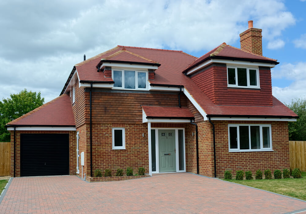 A newly built detached family home ready to move into with driveway and garden in a rural setting in the uk
